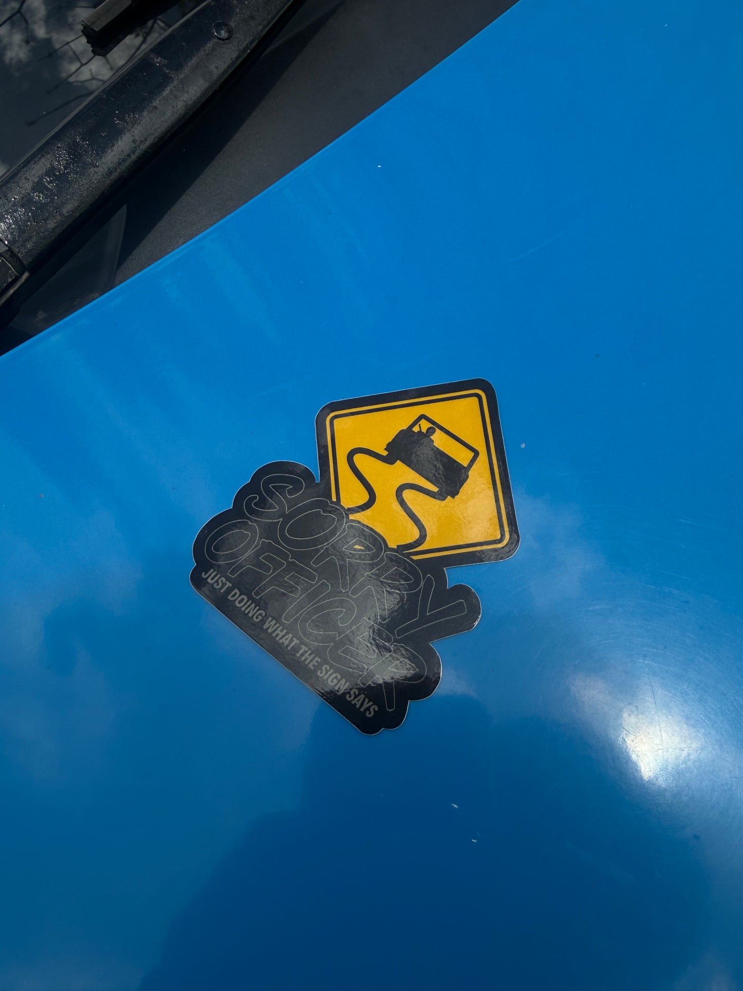 sorry officer just doing what the sign says small sticker